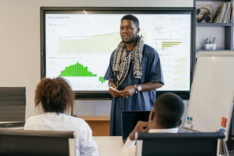 A diverse team engaging in a business presentation in a modern office setting